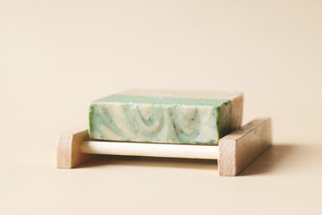 Homemade natural soap bar on black background 