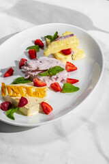 Assorted ice cream with berries