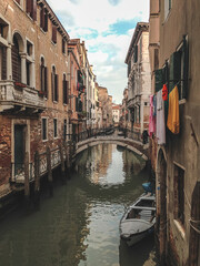 view of venice. Waterway in the old town with boats