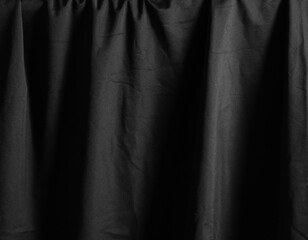 Black luxury fabric background, drapery texture
