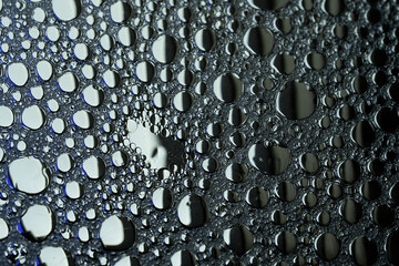 Abstract texture background in black and white. Circles of oil in soapy water.