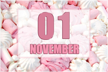 calendar date on the background of white and pink marshmallows.  November 1 is the first day of the month