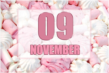 calendar date on the background of white and pink marshmallows. November 9 is the ninth day of the month