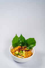 Fermented Pork and Crisp Rice Salad or Yam Naem Khao Tod Recipe,Thai food concept, Top view  with white background,  Thai Street Food, Copy space, Space for text.