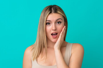 Fototapeta premium Young caucasian woman isolated on blue background . Portrait