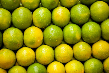 Stacked fresh lime fruits