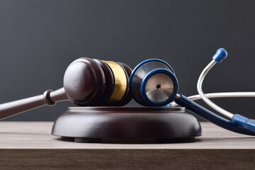 Fair social justice concept with gavel and stethoscope front view