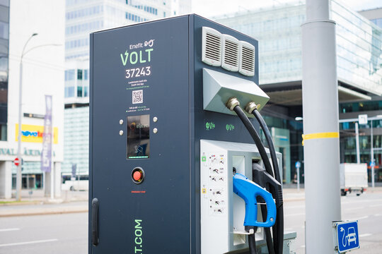 Tallinn, Estonia - September 23, 2022: Enefit Volt public electrical vehicle charging point. Electric car charging station in city center.