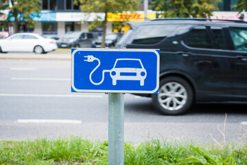 Public electrical vehicle charging point traffic sign. Electric car charging station sign.