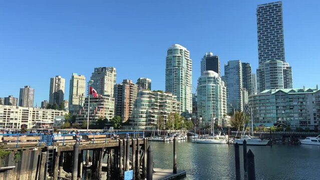 Granville Island peninsula and shopping district in Fairview district of Vancouver BC across False Creek from downtown Vancouver under southern end of the Granville Street Bridge 09.2022 Canada