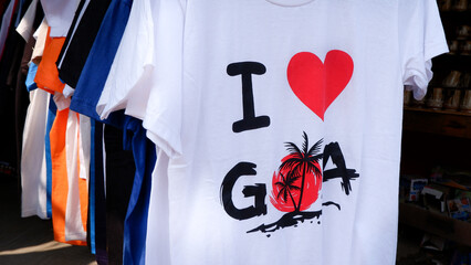 I love goa written on t-shirt is for sale in local goa market. - obrazy, fototapety, plakaty