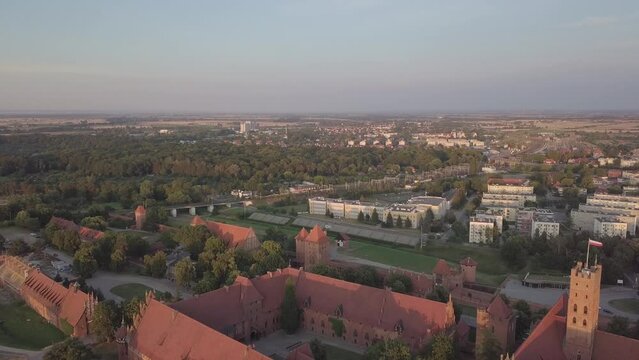 Malbork Castle and Nogat River in Poland Golden hour aerial drone footage