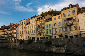 Fototapeta na wymiar Historic buildings on the waterfront of the Ljubljanici River in central Ljubljana, Slovenia 