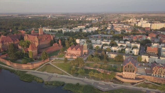 Malbork Castle and Nogat River in Poland Golden hour aerial drone footage