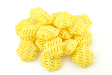 Pile of salty fried snacks isolated on white background. Light crispy appetizer