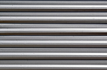 Obraz premium Gray corrugated metal plate surrounding wasteland