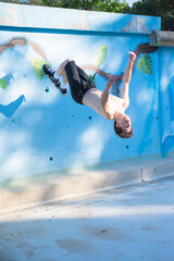 young guy doing parkour in the urban area