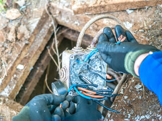Repair work on an external lighting electrical system to an underground junction box. The...