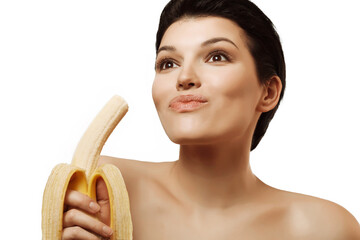 Girl eating a banana - 536377924
