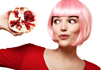 Girl with pomegranate. Pink hair. Makeup. - 536377952