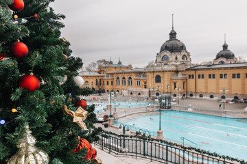 Courtyard of Szechenyi Baths, Hungarian thermal bath complex and spa treatments. New year BUDAPEST, HUNGARY - obrazy, fototapety, plakaty