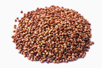 Buckwheat grains on a white background