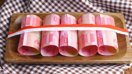 The food is out of the money(rupiah).Conceptual photography. selective focus