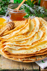 Custard pancakes from kefir and boiling water with jam