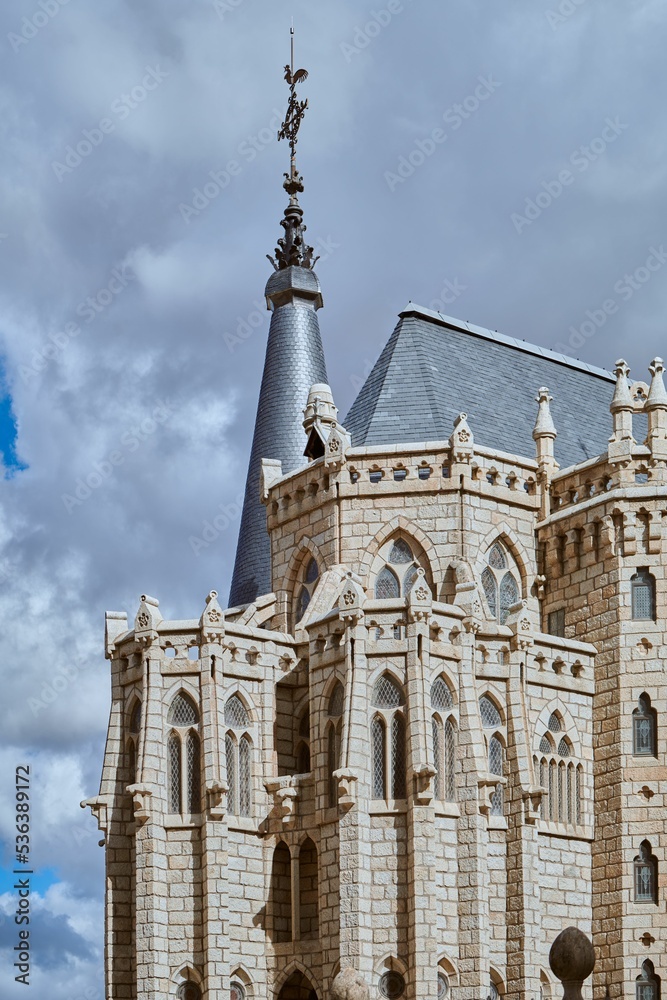 Wall mural Building facade of episcopal palace of Astorga under blue bright sky in Spain