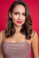 Vertical confident, charming, posh, elegant woman with red lipstick, looking at camera in studio....