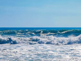 Naklejka na ściany i meble Extremely huge big surfer waves at beach Puerto Escondido Mexico.