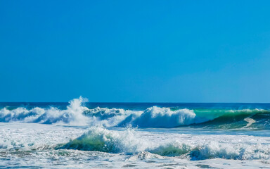 Obraz premium Extremely huge big surfer waves at beach Puerto Escondido Mexico.