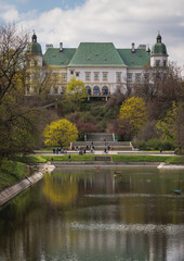 Fototapeta na wymiar Ujazdow Castle and Royal Canal in Agrykola Park in Warsaw city, Poland