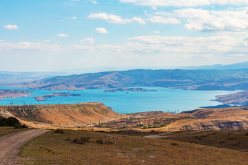 Turquoise mountain lake among the rocks.