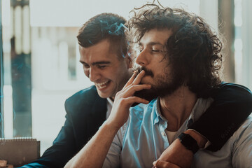 Portrait of multiethnic diverse gay LGBT romantic male couple embracing and showing their love