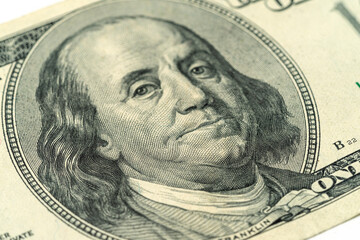 Money, US dollar bills background. Paper money is scattered on the table with silver coins. Photo for finance and economics concepts.