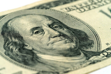 Money, US dollar bills background. Paper money is scattered on the table with silver coins. Photo for finance and economics concepts.