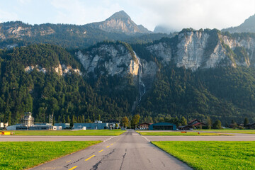 Oltschibachfall seen from Meiringen Airport in Switzerland. This waterfall is located in Meiringen,...