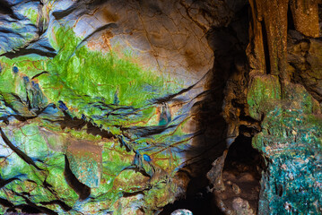 Inkaya Cave in Yelki, Guzelbahce. Colorful cave entrance with natural daylight.