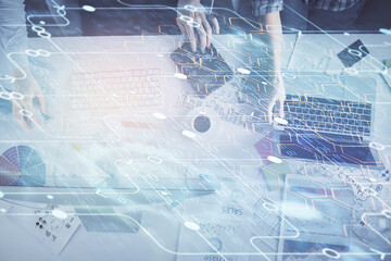 Double exposure of man and woman working together and technology theme drawing hologram. Big data concept. Computer background.