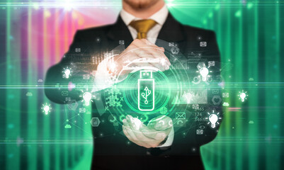 Businessman holding technology icon concept