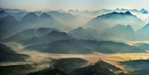 Fototapeta premium silhouettes of morning mountains. foggy morning in the Carpathians. Mountain landscape