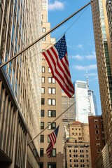 American flag on the narrow streets of New York