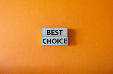 Best choice symbol. Wooden blocks with words Best choice. Beautiful orange background. Business and Best choice concept. Copy space.