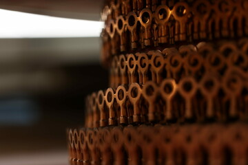 Shallow foucs shot of deatil of brown copper round wires with blur background