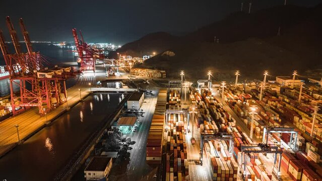 time lapse aerial view of ningbo harbor at twilight
