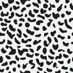 Vector illustration leopard print seamless pattern. Black hand drawn background. Vector illustration
