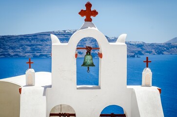Beautiful shot of the Three Bells of Fira, Firostefani in Greece