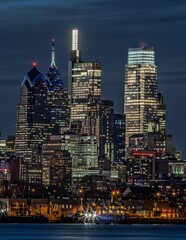 Vertical shot of skyscrapers in Philadelphia at night