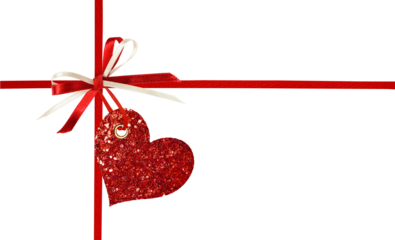 Crossed silk ribbons and a bow with glitter heart isolated on white. Concept of present for Valentine’s Day.